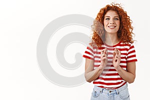 Girl believed luck her side. Optimistic good-looking redhead curly girlfriend praying cross fingers faith anticipate