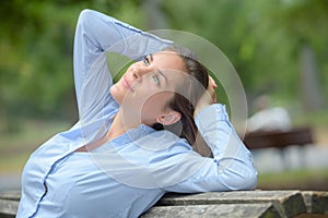 Girl on bench relaxing