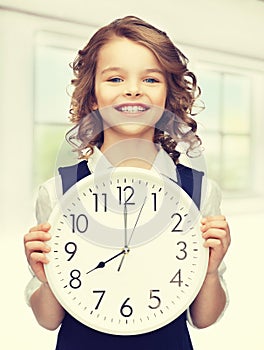 Girl with big clock