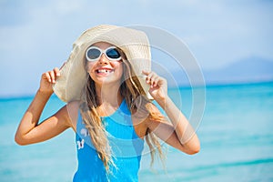 Girl in big hat relax ocean background