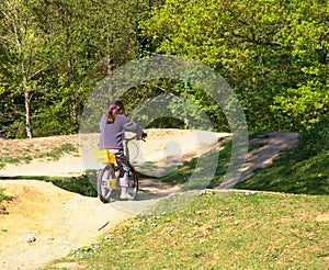 Girl on bike in park