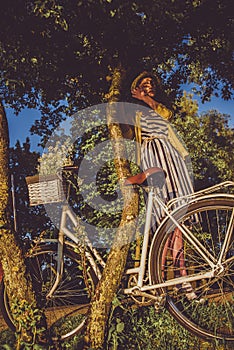 Girl on a bike ride with a retro hipster bike