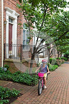 Girl Biking to School photo
