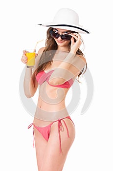 Girl in bikini with orange juice