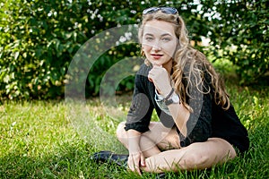 Girl in black on the grass