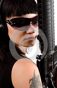 Girl in black with gun