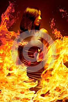 Girl is in blazing flame photo