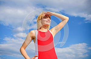 Girl blonde lady smiling enjoy warm sunlight blue sky with clouds background. Girl playful mood coquette. Flirt and