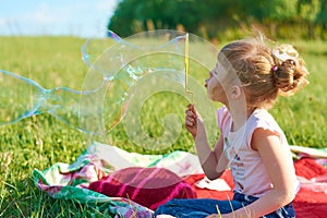 Girl blow bubbles