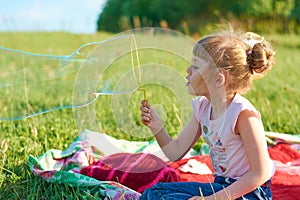 Girl blow bubbles