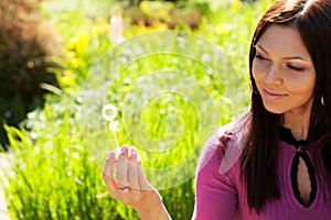 Girl blow soap bubble