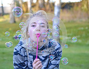Girl blowin bubbles
