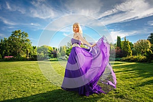 Girl in blowing dress Outdoors