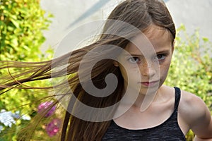 Girl with blowing hair