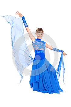 Girl in blue dress posing in studio