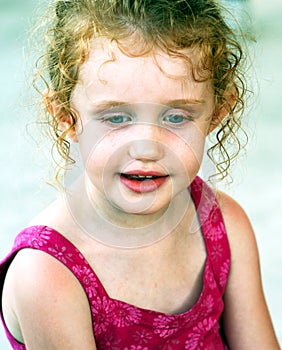 A Girl with Blue Eyes and Ringlets photo