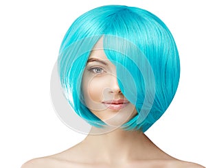 Girl with blue hair. Model with colored haircut. Woman with voluminous updo hairstyle