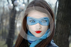 Girl in blue mask