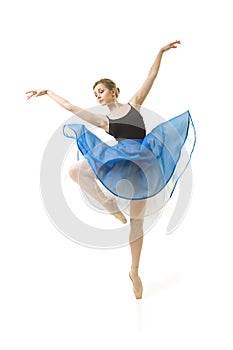 Girl in a blue skirt and a black leotard dance ballet