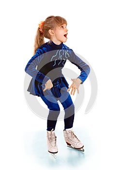 Girl in blue sport dress on skates.