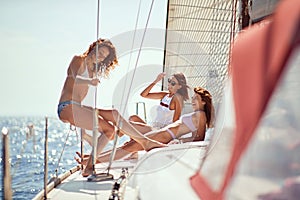 Girl on the boat have party. Sailing the sea