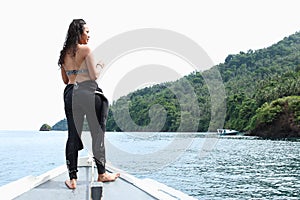 Girl on boat in Lembeh Strait photo