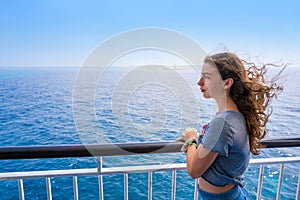 Girl in boat railing at Formentera Ibiza