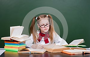 Girl with books before exams