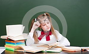 girl with books before exams