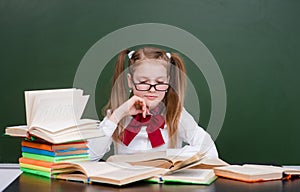 Girl with books preparing for the exam