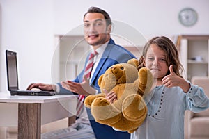 Girl bothering young father during working from house in pandemi