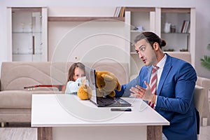 Girl bothering young father during working from house in pandemi