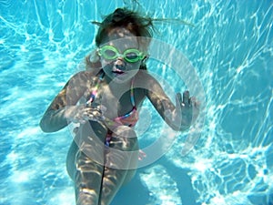 Girl on the Bottom of a Pool