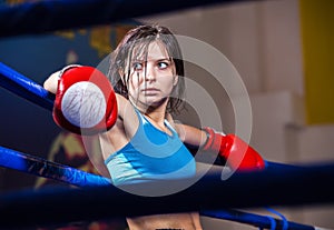 Girl boxer in boxing ring