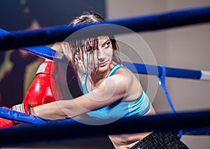 Girl boxer in boxing ring