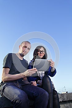 Girl and boy with tablet pc