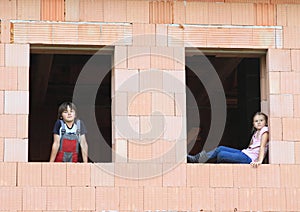 Girl and boy in the windows