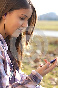 Girl with braces, listen to music player