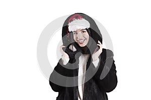 Girl in braces santa hat isolated, joyfulperson fur coat