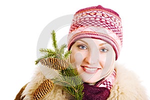 Girl with a branch of fur tree