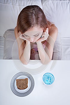 Girl on a bread and water diet