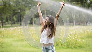 Girl breathe and get fresh air in garden