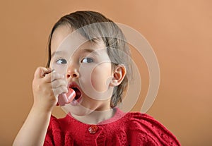 Girl breathing asthmatic medicine photo