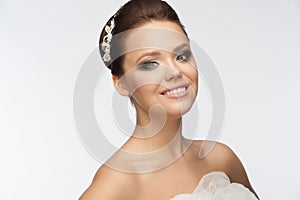 Girl with bridal hairstyle and makeup