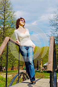 Girl on bridge in park