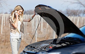 Girl with broken car