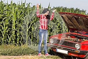 Girl with broken car