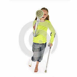 Girl with a broken leg walking on crutches