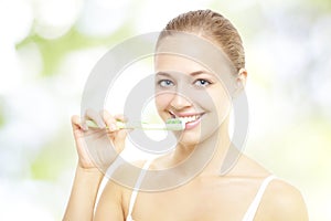 Girl brushing her teeth