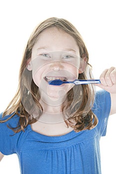 Girl brushing teeth